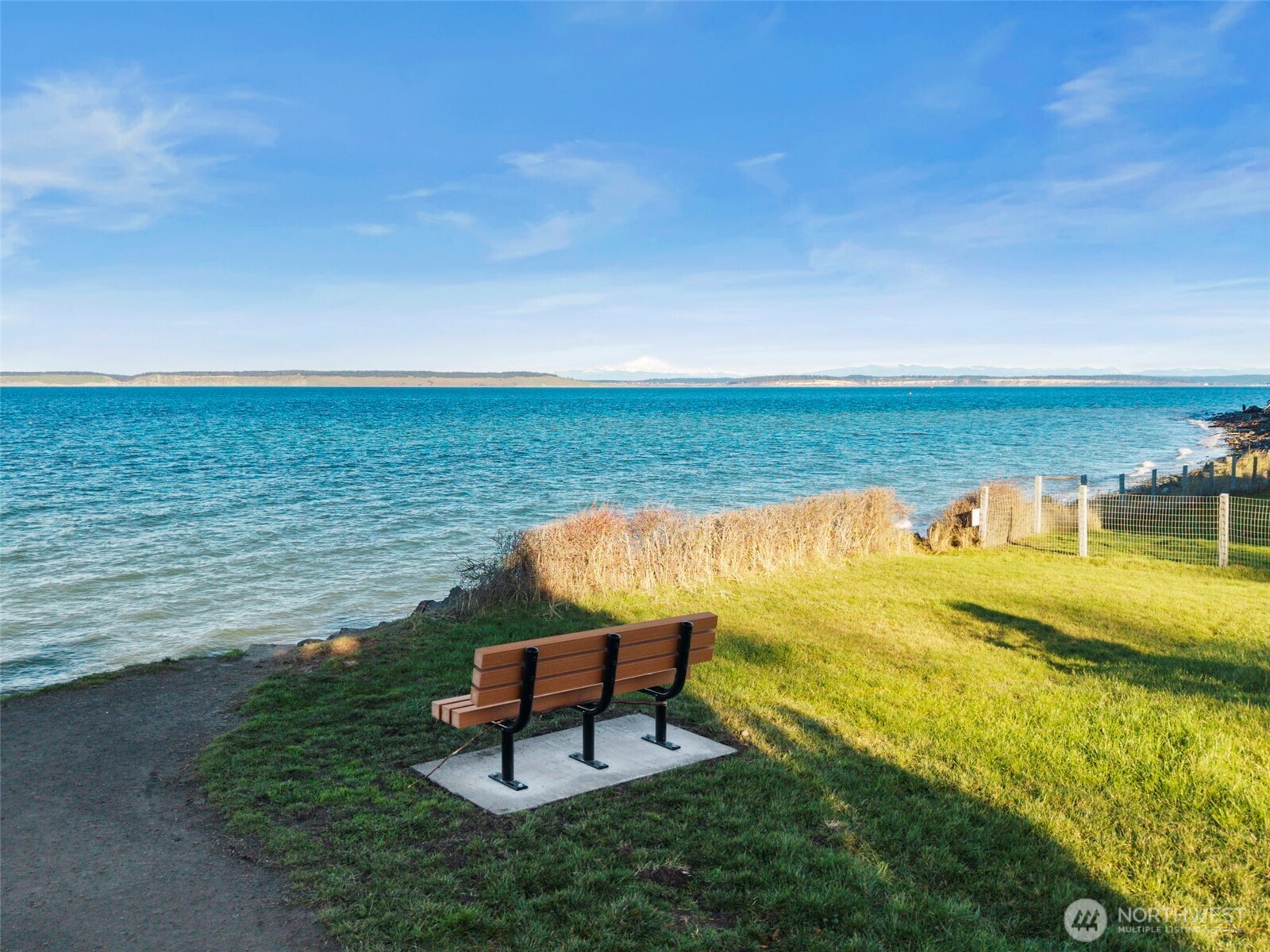 909 55th Street Port Townsend, WA 98368 - Photo 28 of 36 a view of a ocean with a outdoor space