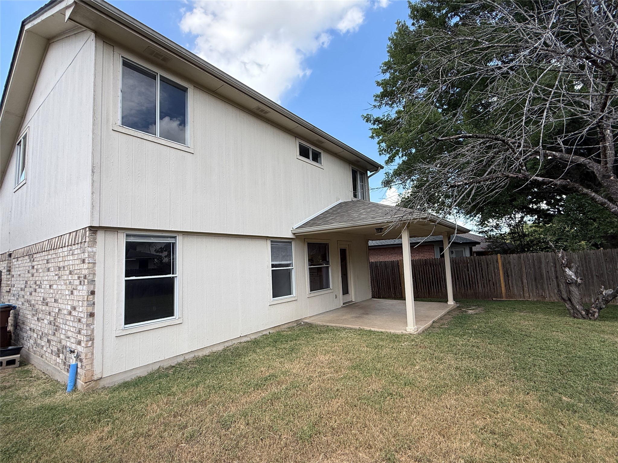 2120 Jester Farms Road Round Rock, TX 78664 - Photo 25 of 28 A private backyard oasis features a covered patio perfect for al fresco dining.