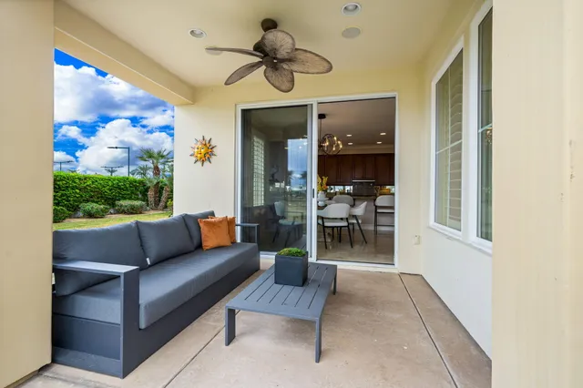 a spacious bedroom with a bed and a window