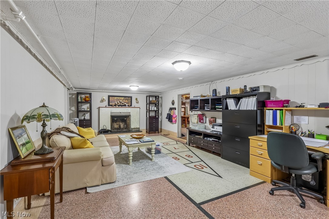 836 Jacoby Road Akron, OH 44333 - Photo 25 of 45 Lower level owner's suite with fireplace