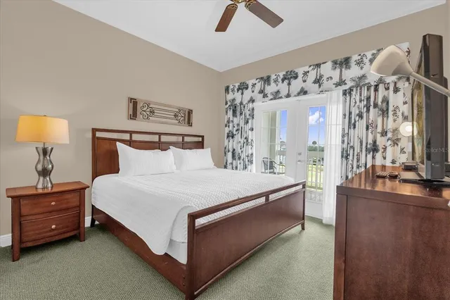 a bed room with a bed and a night stand