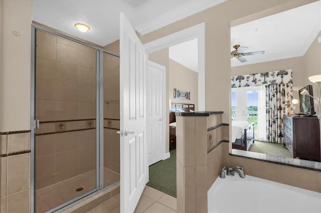 a bathroom with a shower and a sink