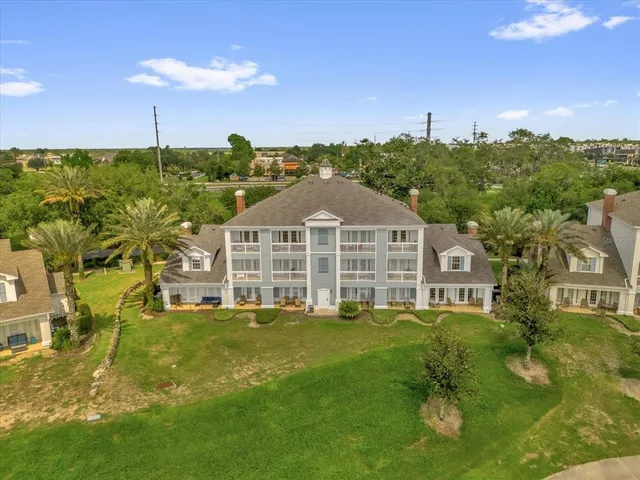 a view of a house with a big yard