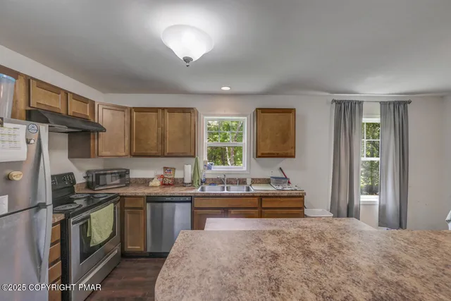 a bed room with a bed and a lamp