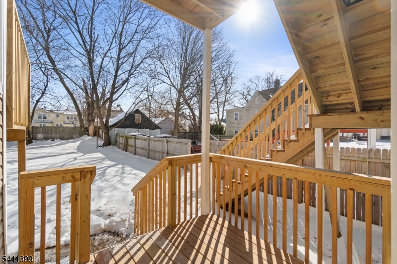 826 George Street, Unit 1 Plainfield, NJ 07062 - Photo 19 of 21 a view of a house with wooden deck next to a building