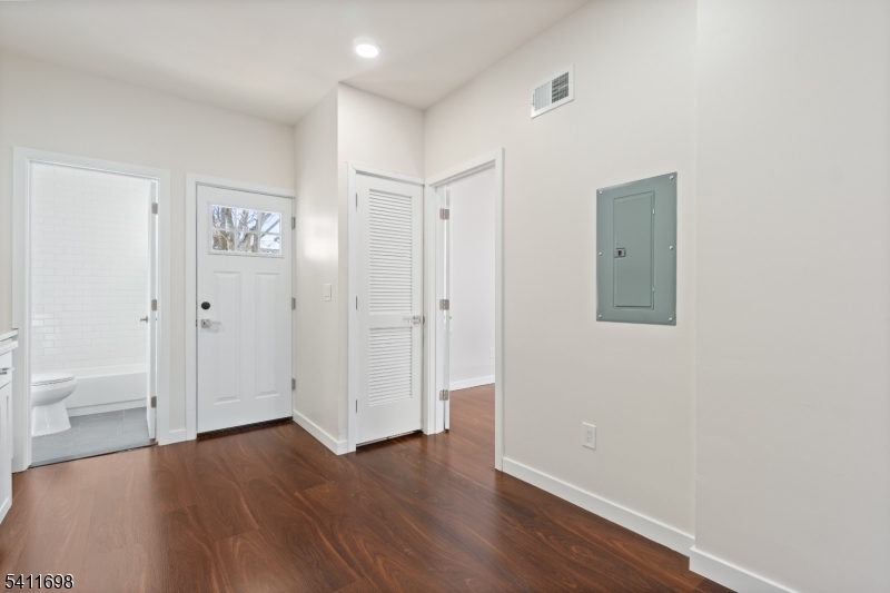 826 George Street, Unit 1 Plainfield, NJ 07062 - Photo 9 of 21 an empty room with wooden floor