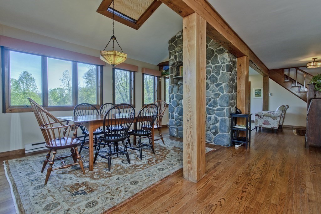 135 George Lamb Road Leyden, MA 01337 - Photo 14 of 42 a view of a dining room with furniture window and wooden floor