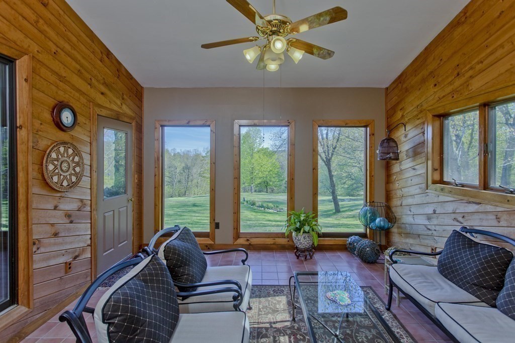 135 George Lamb Road Leyden, MA 01337 - Photo 20 of 42 a living room with furniture and a window