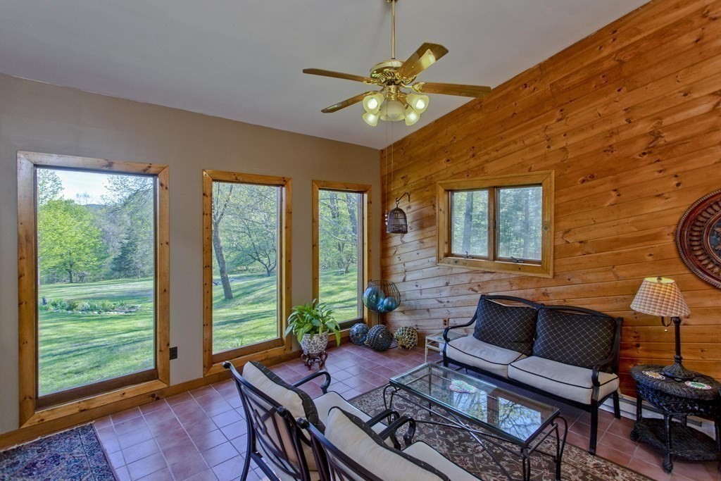 135 George Lamb Road Leyden, MA 01337 - Photo 21 of 42 a living room with furniture and a window