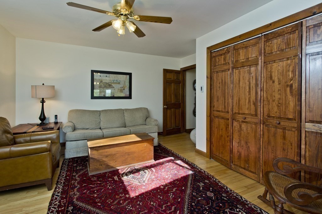 135 George Lamb Road Leyden, MA 01337 - Photo 24 of 42 a living room with furniture a dining table and a window