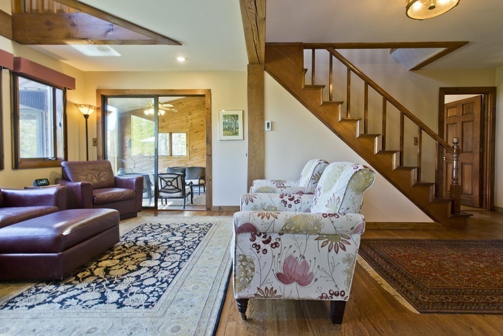 135 George Lamb Road Leyden, MA 01337 - Photo 28 of 42 a living room with furniture and a rug