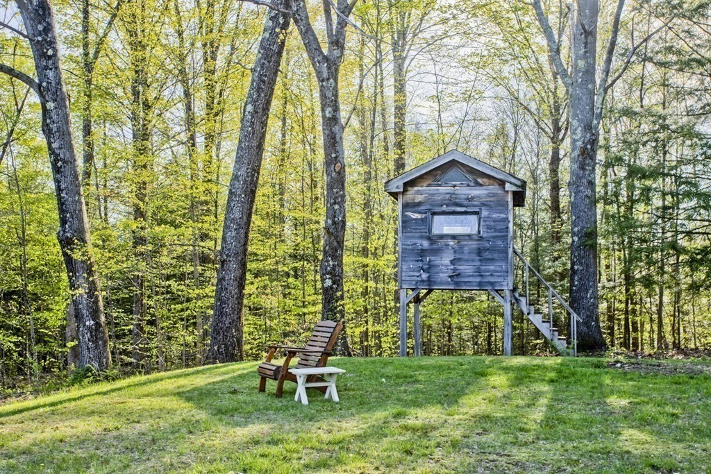 135 George Lamb Road Leyden, MA 01337 - Photo 38 of 42 a backyard of a house with table and chairs