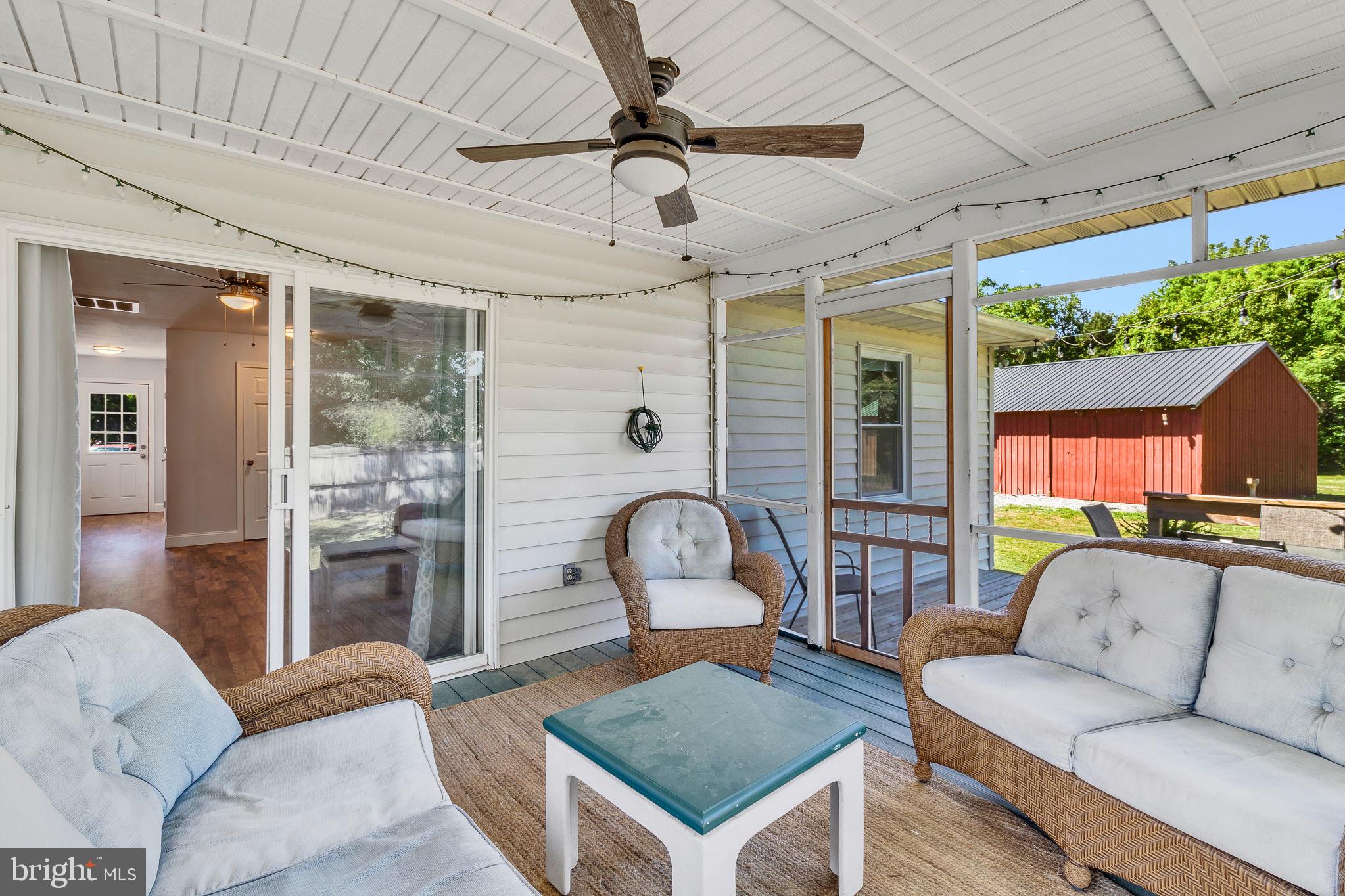 9832 River Road Lancaster, VA 22503 - Photo 20 of 68 Charming porch with serene views.