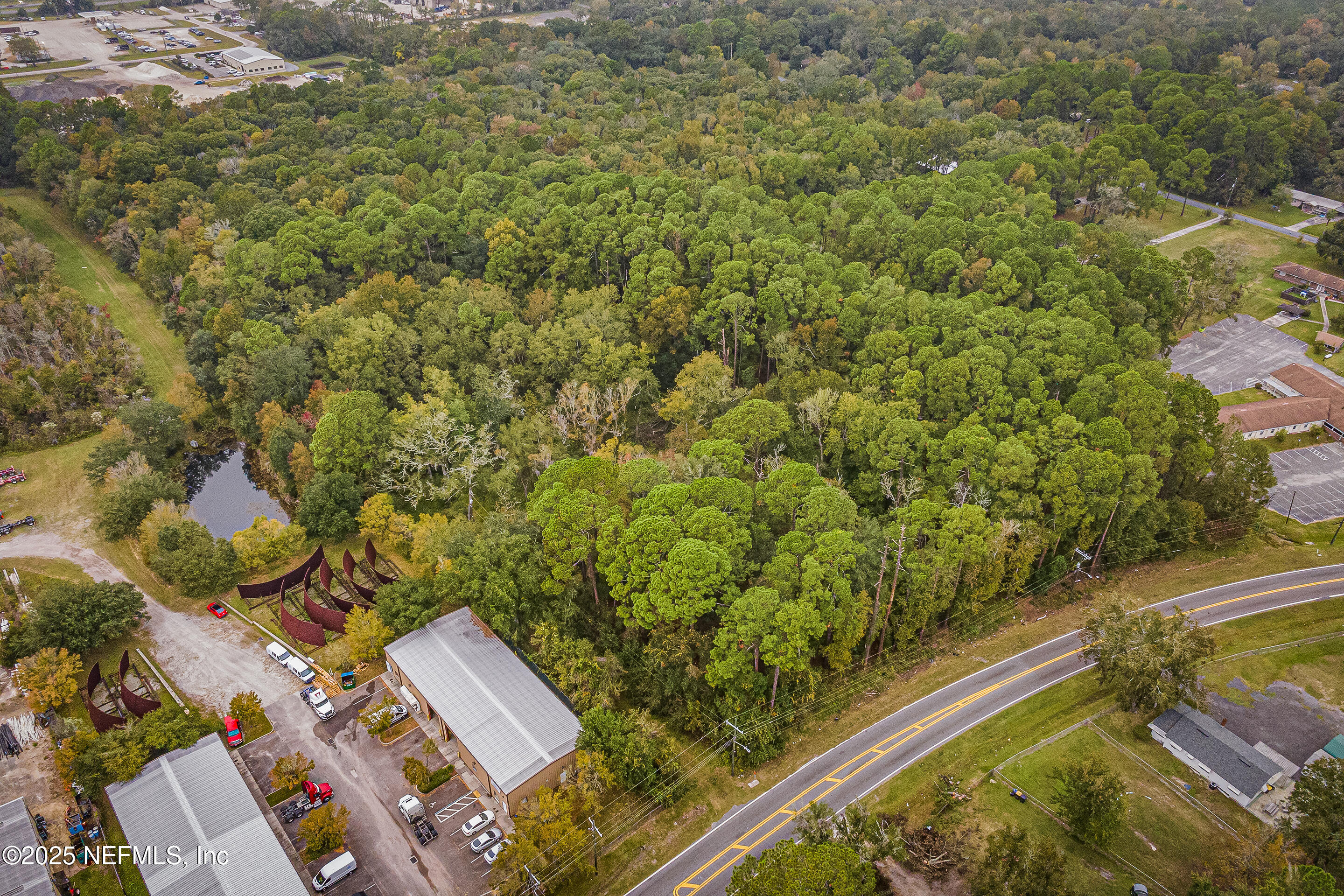 6535 General Lee Road Jacksonville, FL 32254 - Photo 3 of 16 an aerial view of a house with a yard