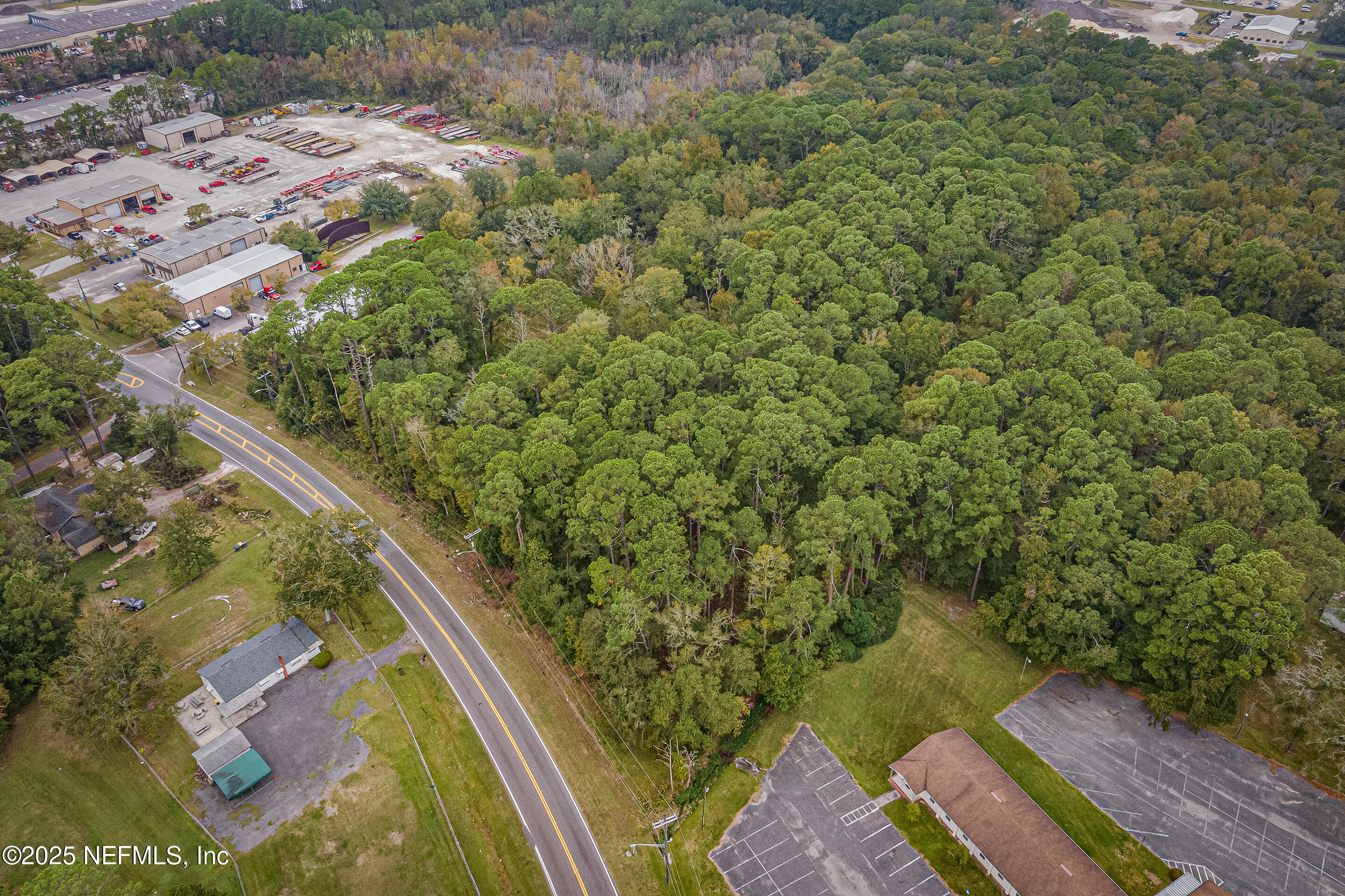 6535 General Lee Road Jacksonville, FL 32254 - Photo 5 of 16 a view of a yard with an outdoor seating