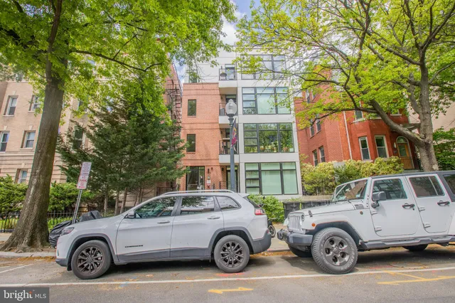a car parked in front of a house