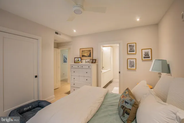 a bedroom with a bed and furniture