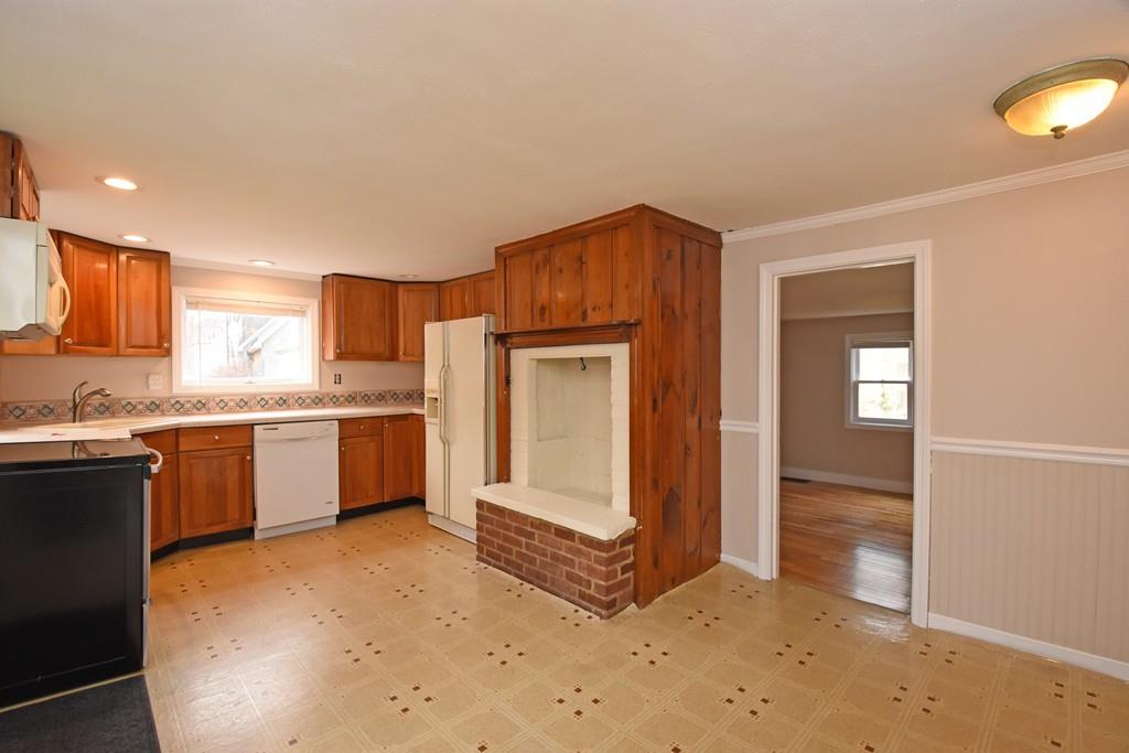 256 Glenwood Road Rutland, MA 01543 - Photo 20 of 30 a kitchen with stainless steel appliances granite countertop a stove a sink and a refrigerator