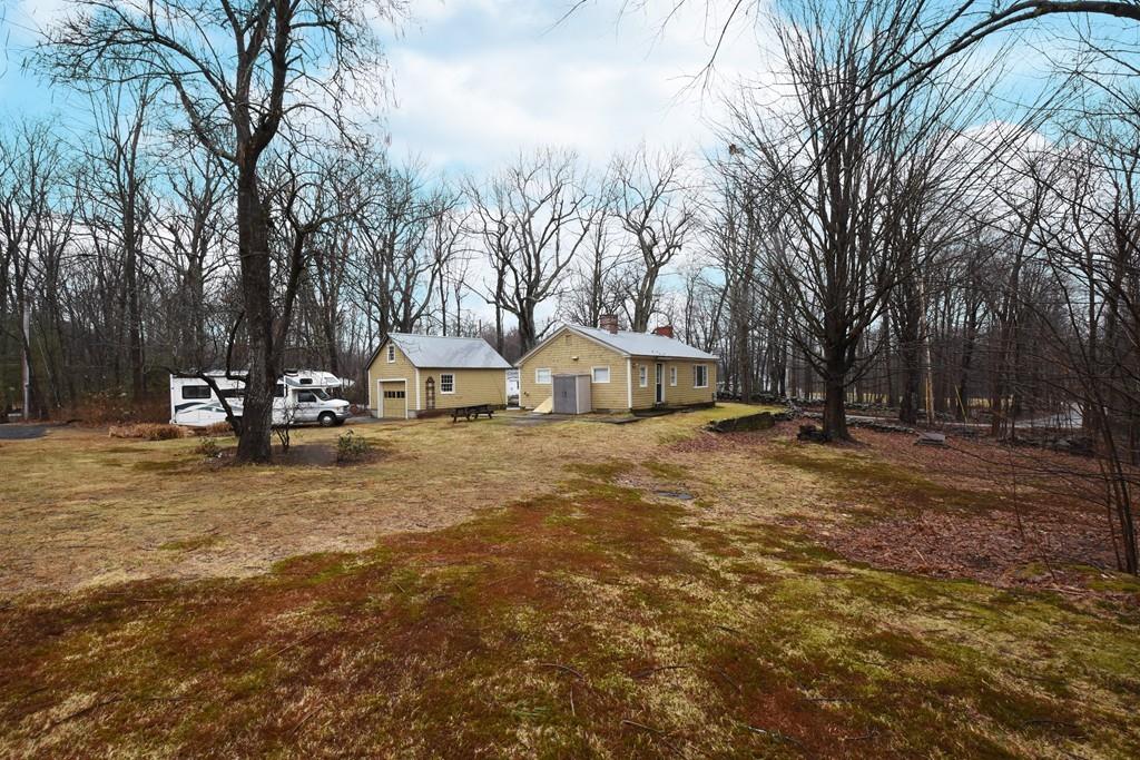 256 Glenwood Road Rutland, MA 01543 - Photo 25 of 30 a view of a house with a yard