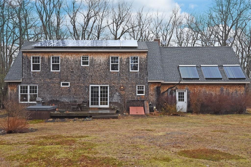 256 Glenwood Road Rutland, MA 01543 - Photo 29 of 30 front view of a house with a yard