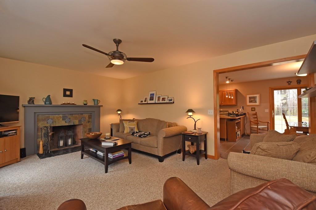 256 Glenwood Road Rutland, MA 01543 - Photo 4 of 30 a living room with furniture and a fireplace