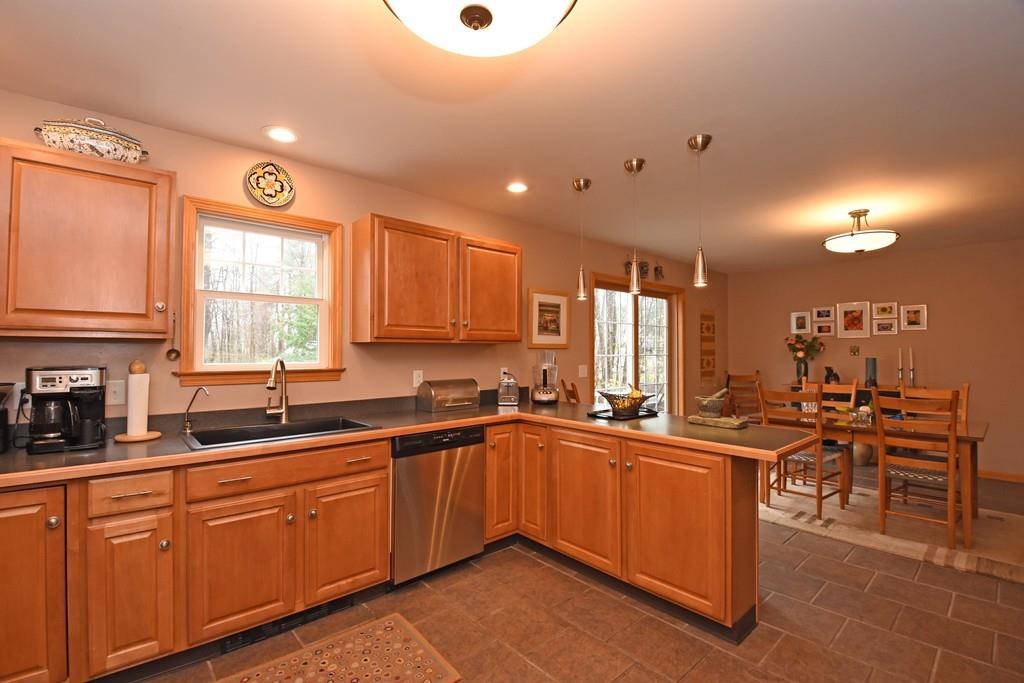 256 Glenwood Road Rutland, MA 01543 - Photo 8 of 30 a kitchen with lots of counter space and sink