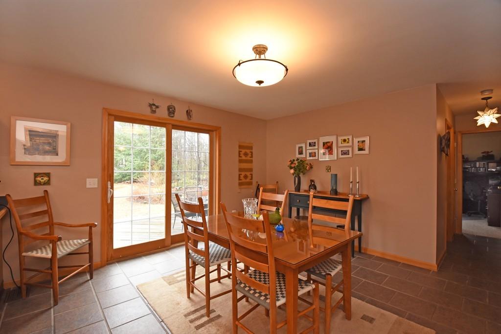 256 Glenwood Road Rutland, MA 01543 - Photo 10 of 30 a view of a dining room with furniture window and wooden floor