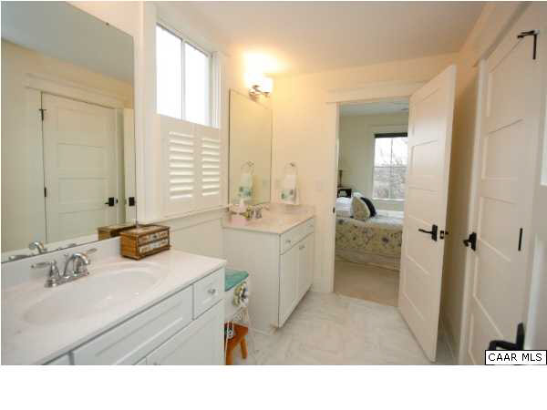 5153 Brook View Road Crozet, VA 22932 - Photo 26 of 48 a bathroom with a sink double vanity and a mirror