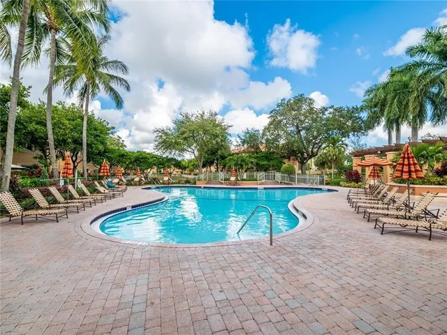 a view of outdoor space with swimming pool