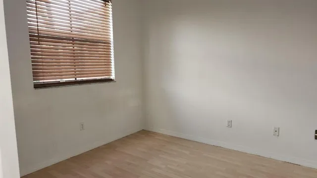 an empty room with a window