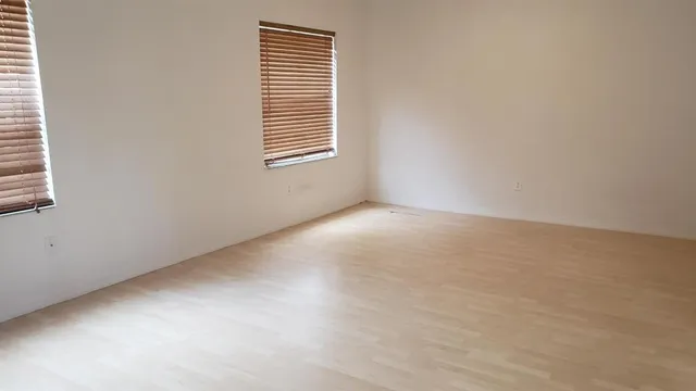 an empty room with windows