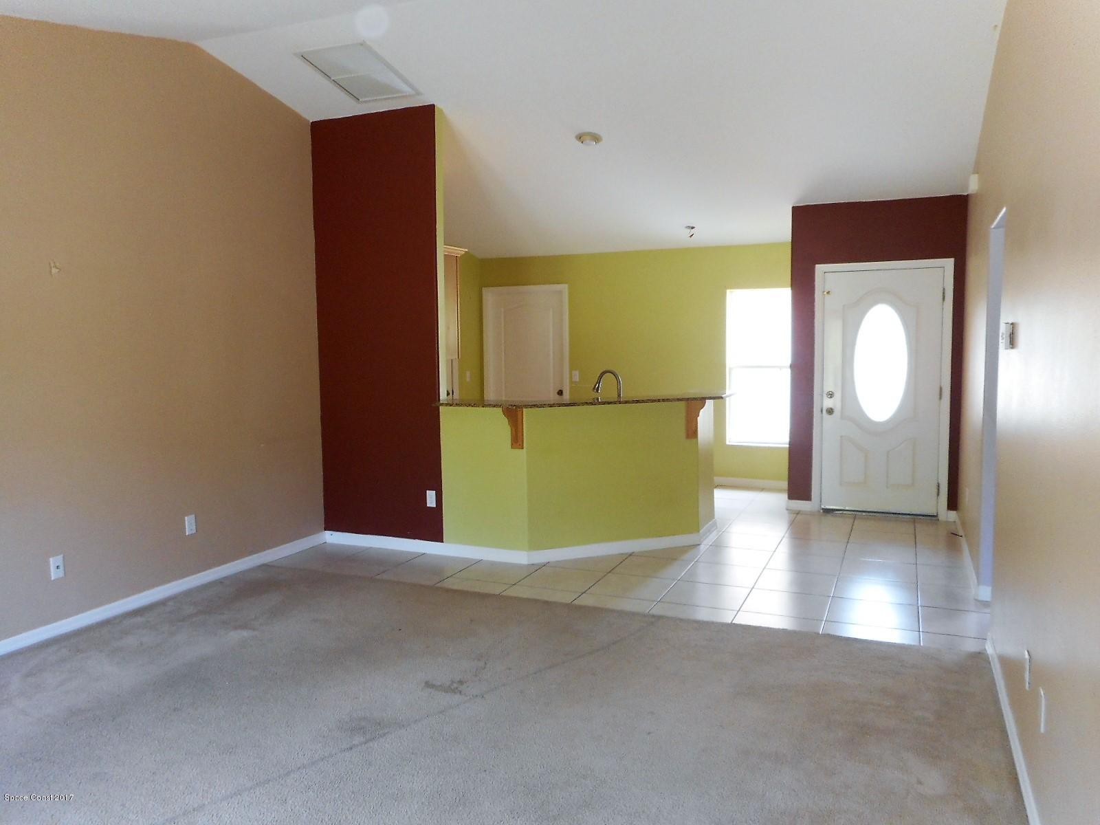 2174 Watkins Road Southeast Palm Bay, FL 32909 - Photo 4 of 13 Dining-living combo