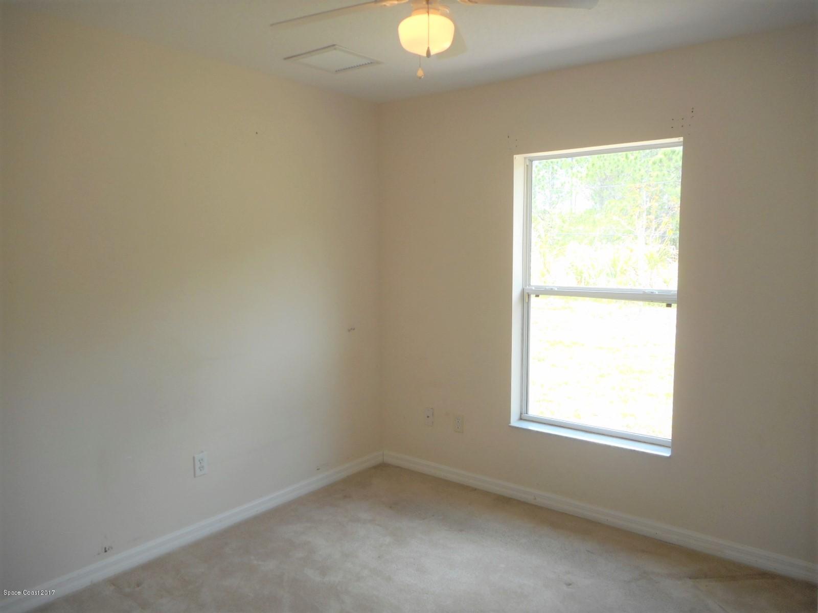 2174 Watkins Road Southeast Palm Bay, FL 32909 - Photo 10 of 13 Bedroom 3