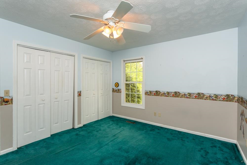 87 Bluestone Drive Weyers Cave, VA 24486 - Photo 16 of 37 a view of an empty room with a window