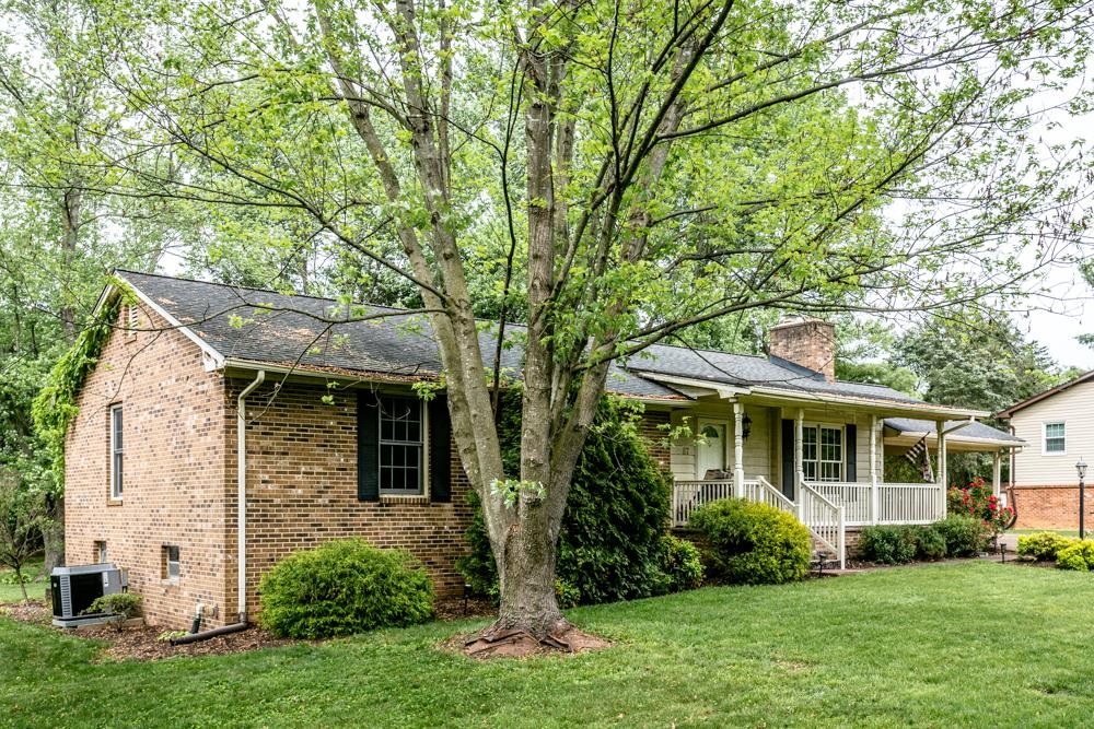 87 Bluestone Drive Weyers Cave, VA 24486 - Photo 25 of 37 front view of a house with a yard