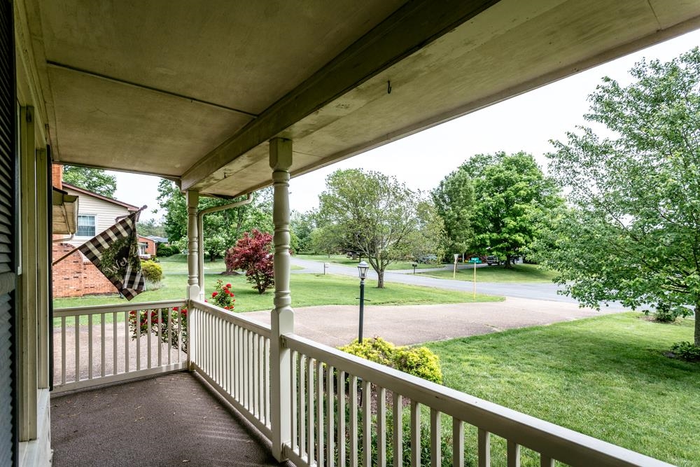 87 Bluestone Drive Weyers Cave, VA 24486 - Photo 27 of 37 a view of a porch and garden