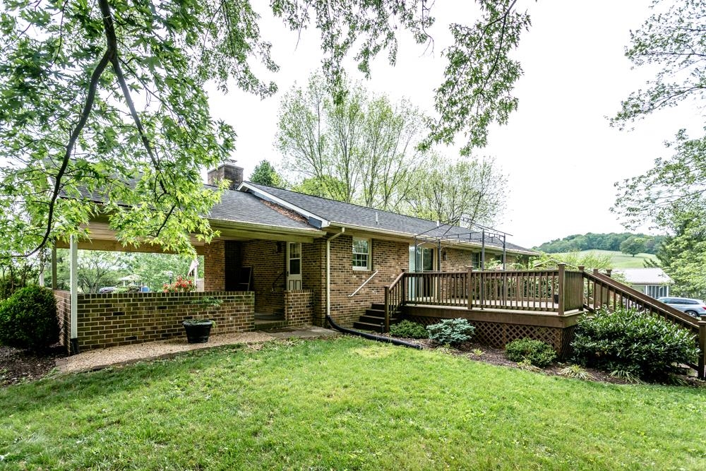 87 Bluestone Drive Weyers Cave, VA 24486 - Photo 29 of 37 front view of a house with a yard