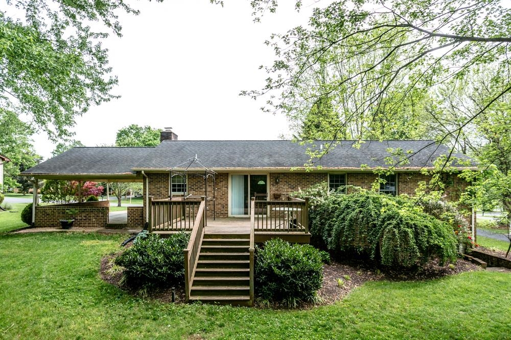 87 Bluestone Drive Weyers Cave, VA 24486 - Photo 30 of 37 front view of a house with a yard