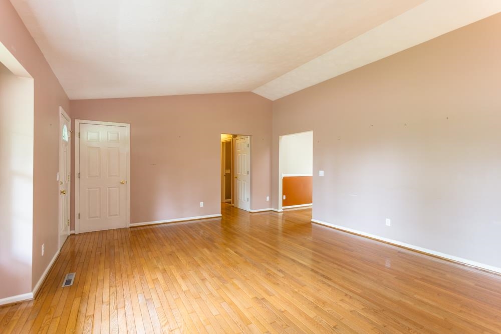 87 Bluestone Drive Weyers Cave, VA 24486 - Photo 10 of 37 a view of an empty room and wooden floor