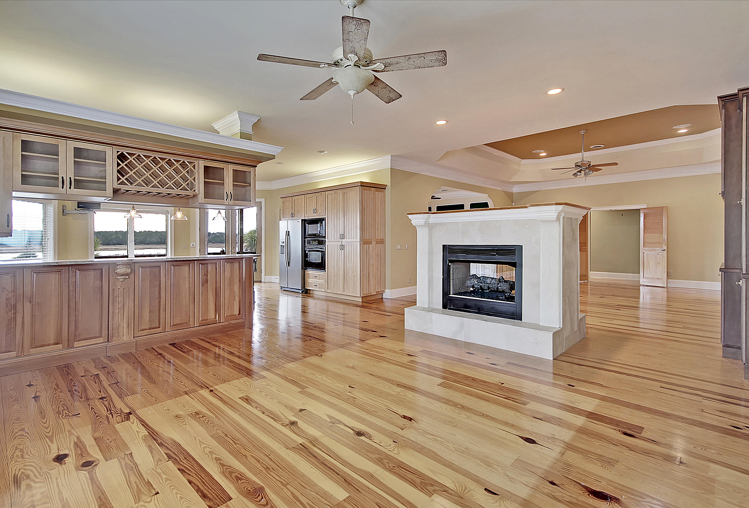 1392 Eden Road Awendaw, SC 29429 - Photo 42 of 60 Double-sided fireplace with built-ins