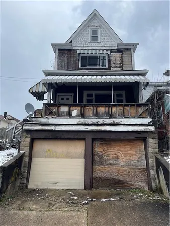a front view of a house with balcony