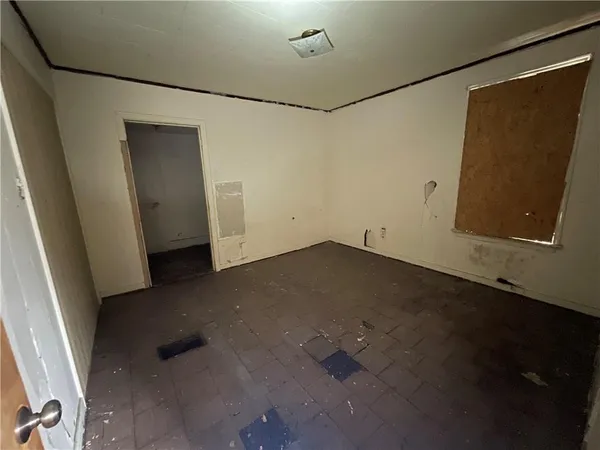 a bathroom with a sink toilet and mirror