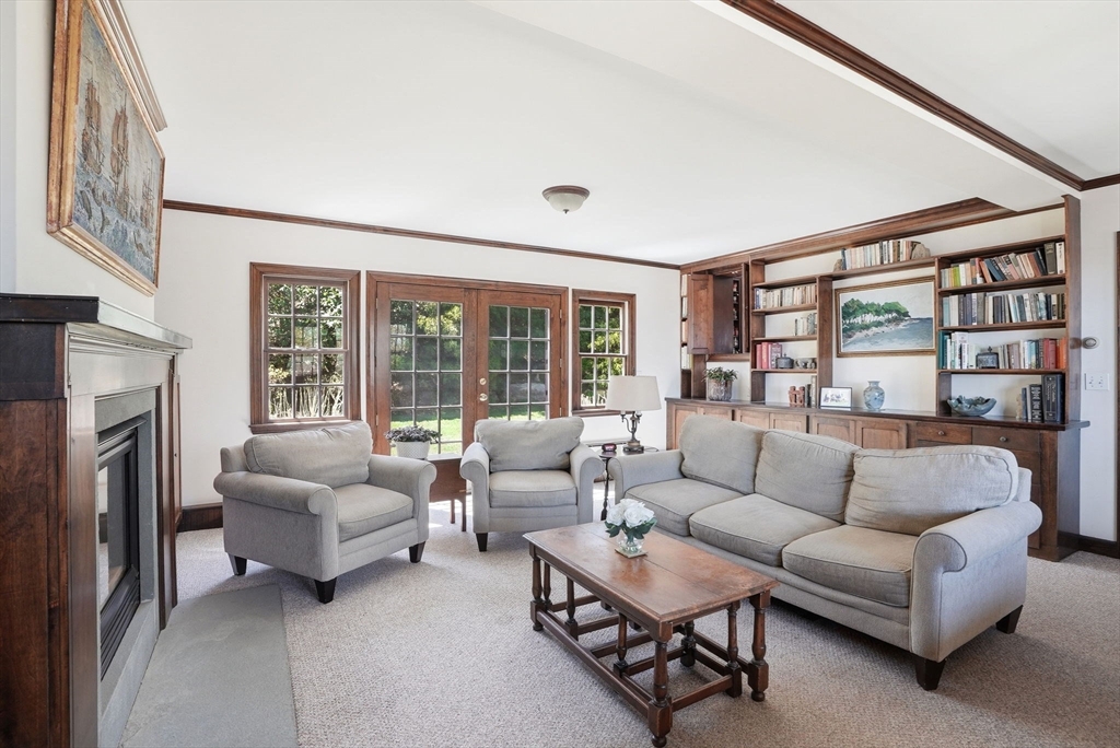 34 Governor Long Road Hingham, MA 02043 - Photo 2 of 37 a living room with furniture and a large window