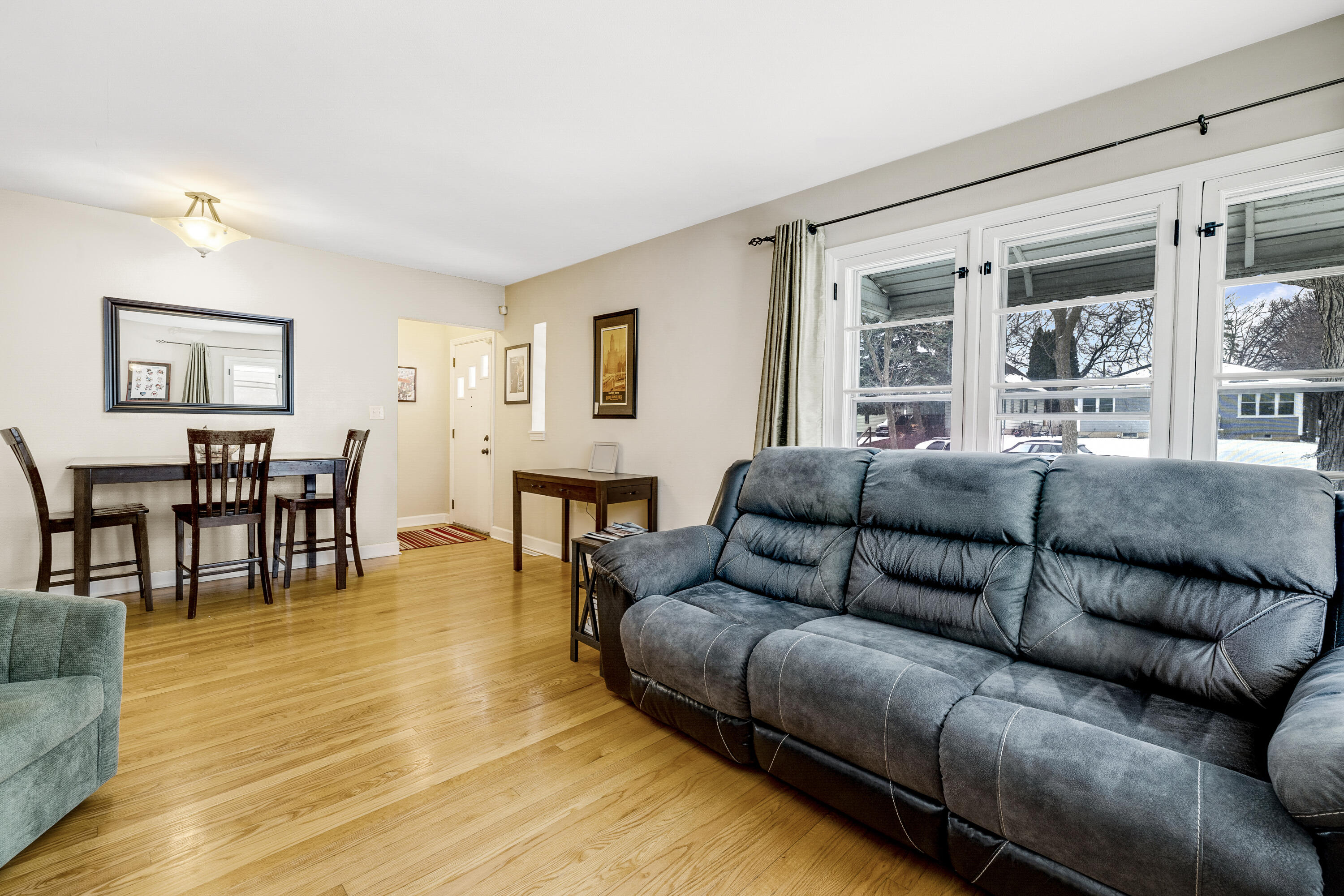 3602 South Whitnall Avenue Milwaukee, WI 53207 - Photo 3 of 10 Wall color behind dining table has been virtually enhanced.