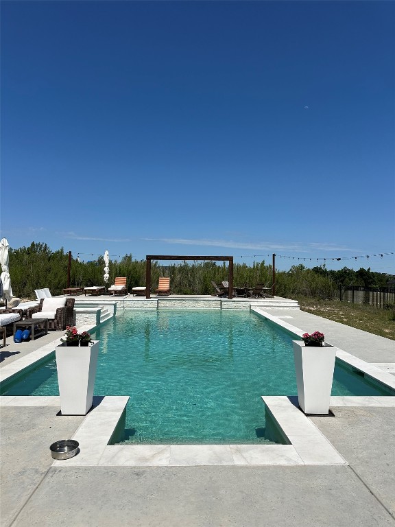 604 Brave Face Street Leander, TX 78641 - Photo 1 of 1 a view of a lake with a yard