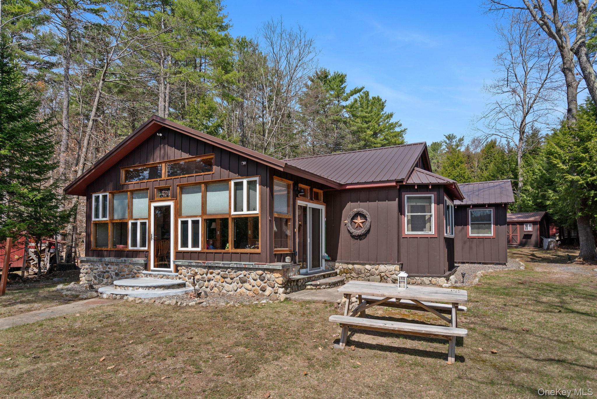 866 North Shore Road Hadley, NY 12835 - Photo 12 of 50 Multiple entertainment and sitting areas.