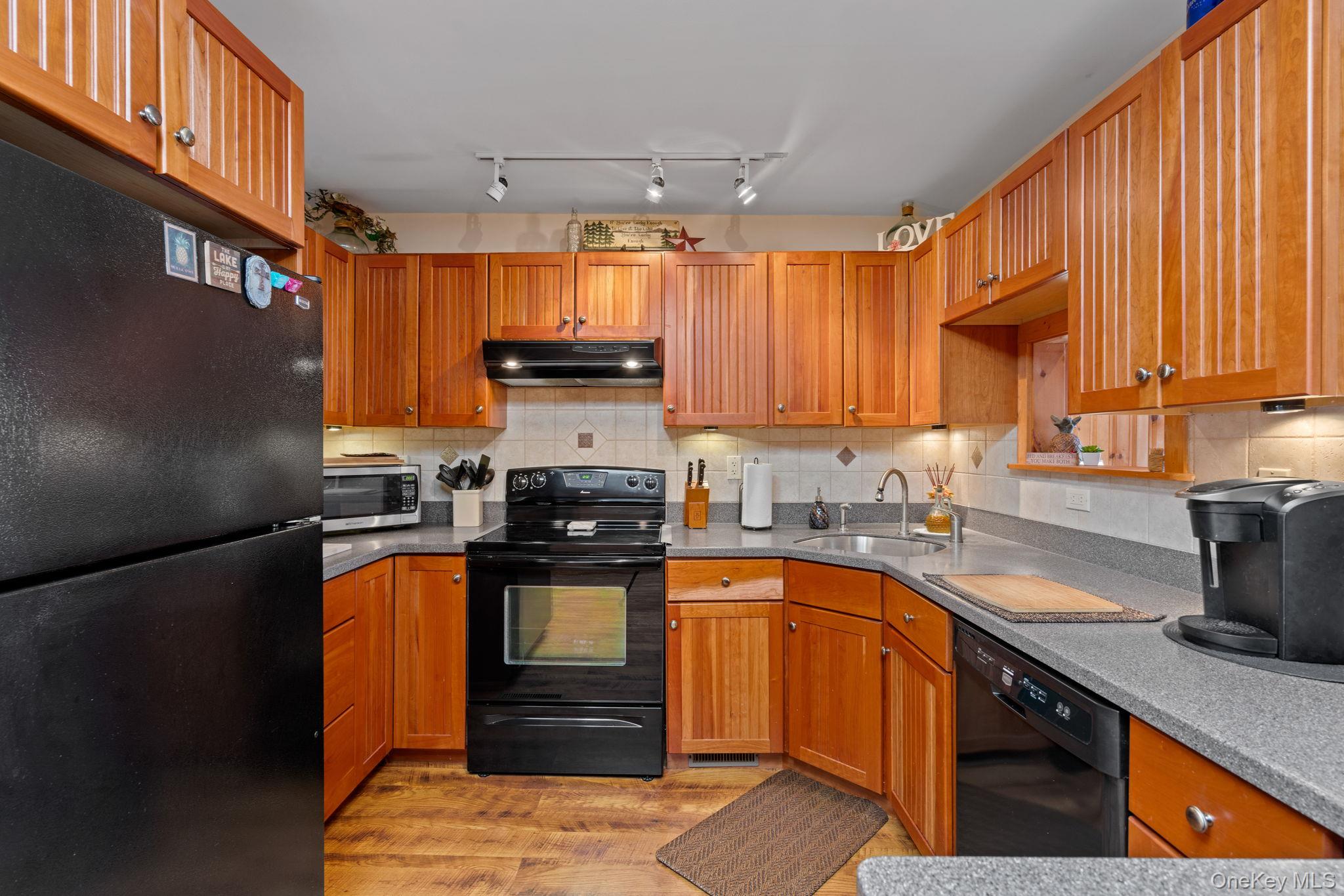 866 North Shore Road Hadley, NY 12835 - Photo 18 of 50 Well appointment kitchen also has a walk-in pantry.