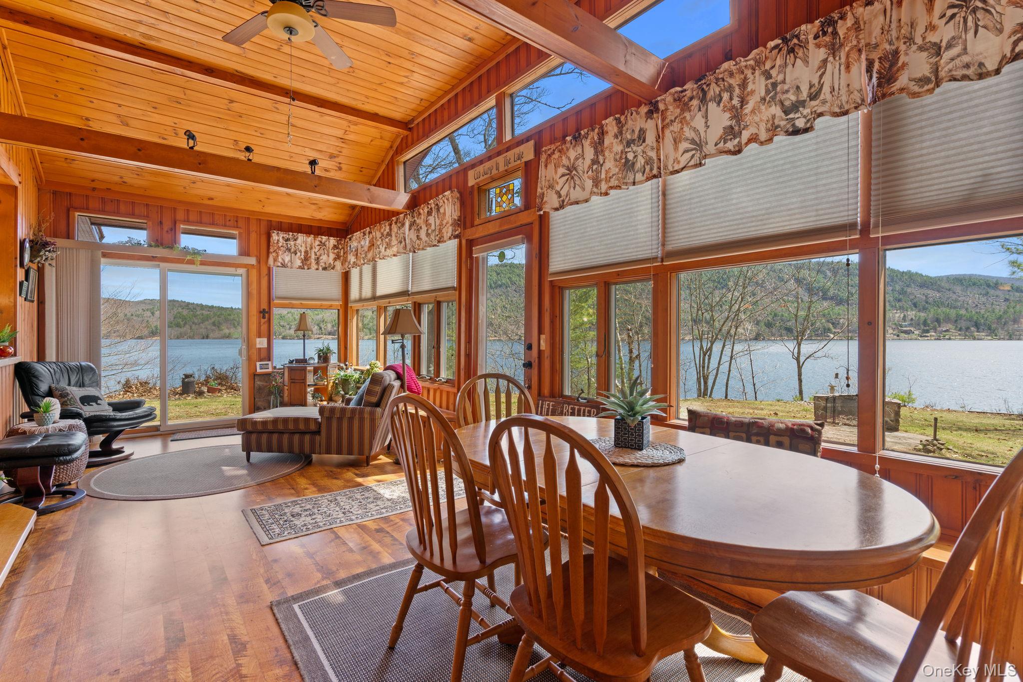 866 North Shore Road Hadley, NY 12835 - Photo 25 of 50 Currently situated dining area with outstanding lake views.