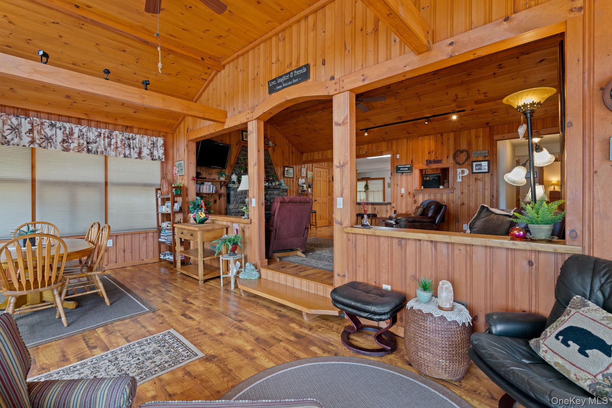 866 North Shore Road Hadley, NY 12835 - Photo 50 of 50 The open floor plan keeps everyone at the lake house engaged.