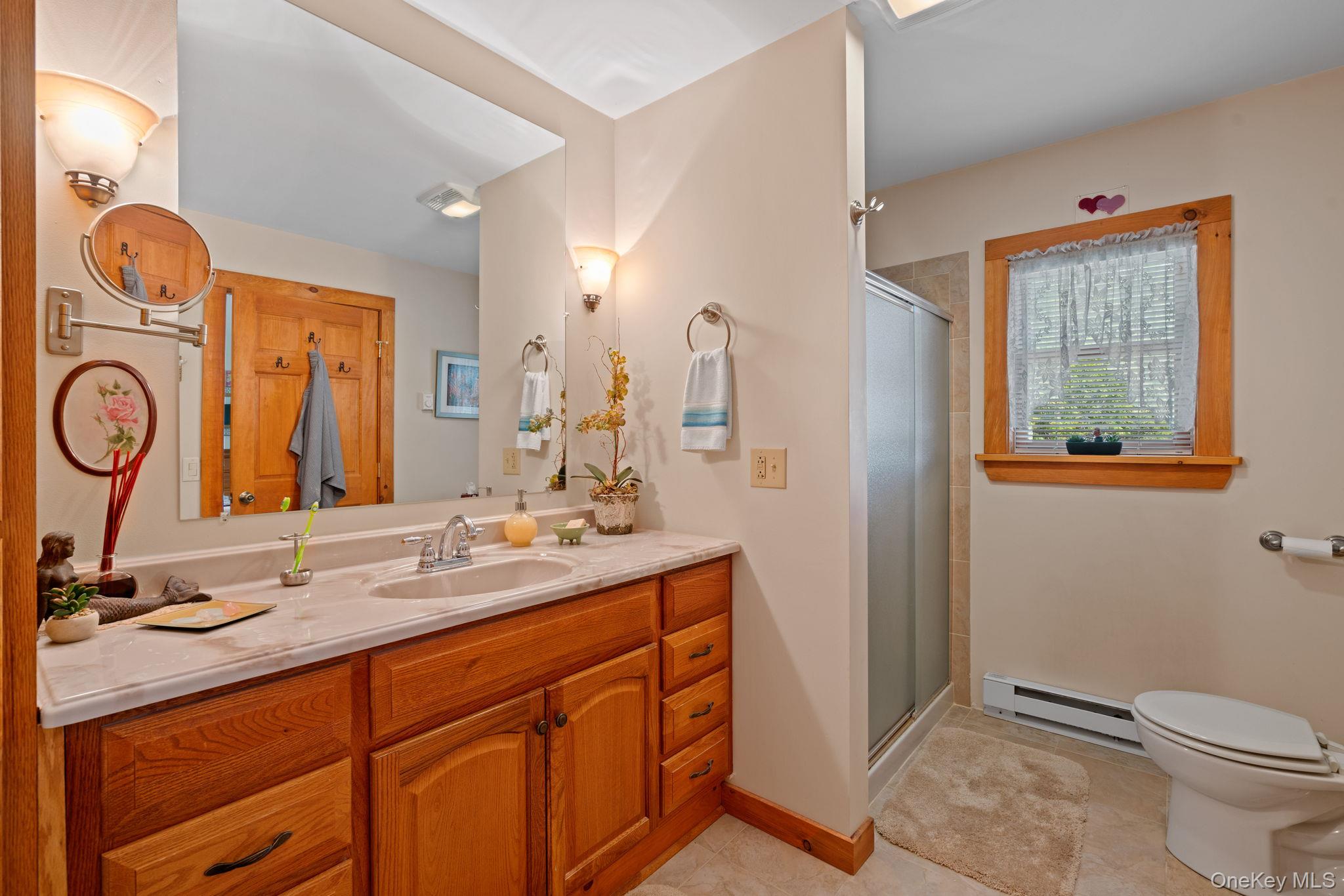 866 North Shore Road Hadley, NY 12835 - Photo 34 of 50 Primary bathroom with walk-in shower.
